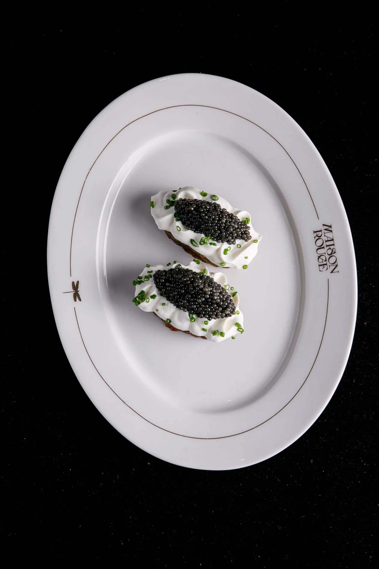 Крудо из гребешка с черным трюфелем.